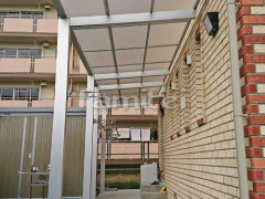 雨除け屋根 三協独立式メニーウェルD1階 収納式物干し